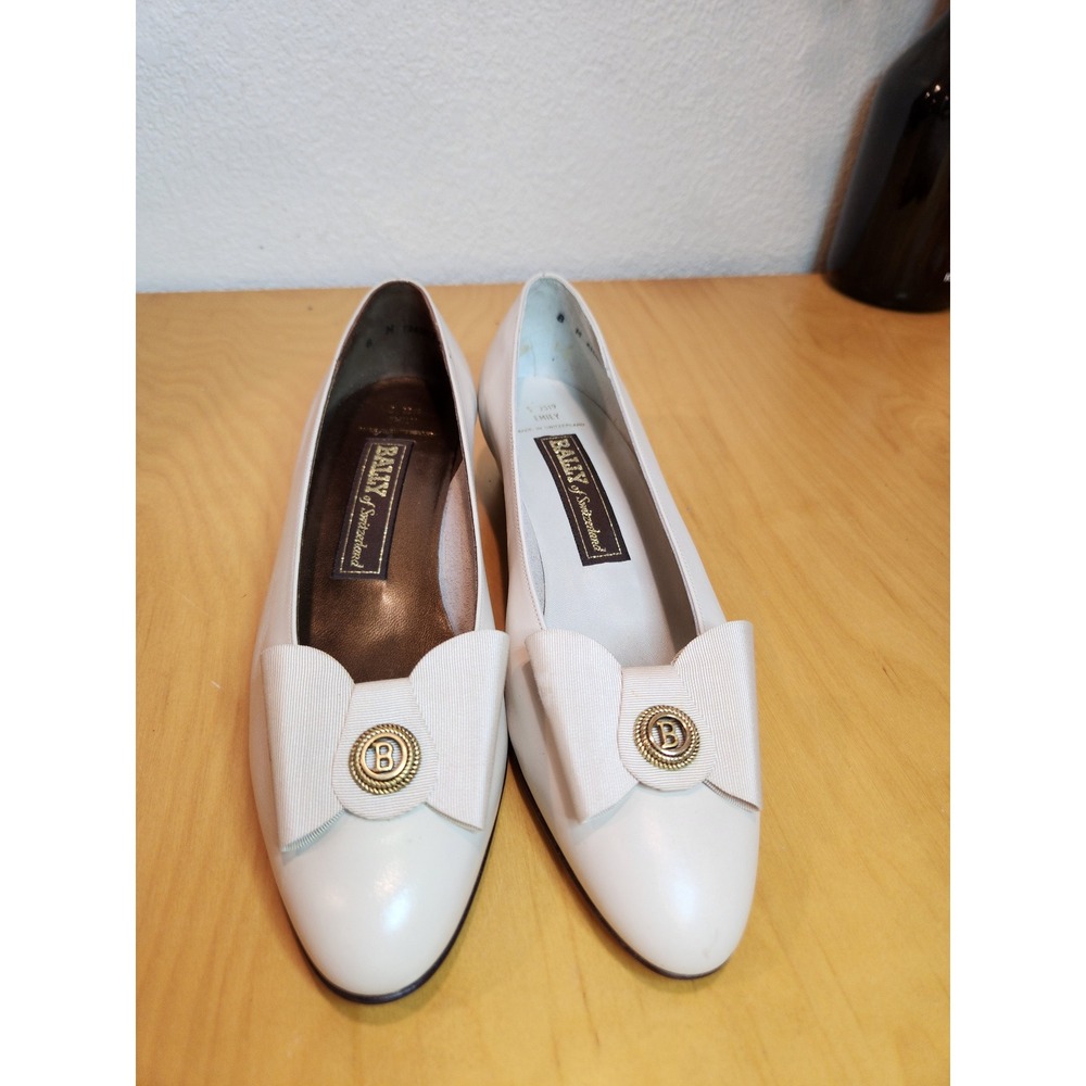 Bally White Leather Bow Loafers with Gold Medallion